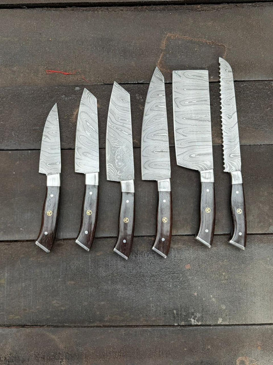 Set of six Damascus knives with wooden handles on a wooden surface