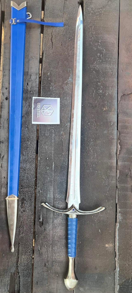 Sword with blue sheath and silver blade on a wooden background