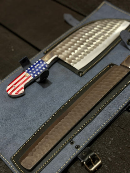 Knife with American flag handle on a blue sheath