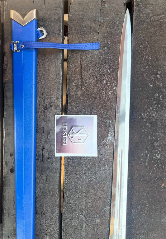 Blue tool with a metallic blade on a textured surface