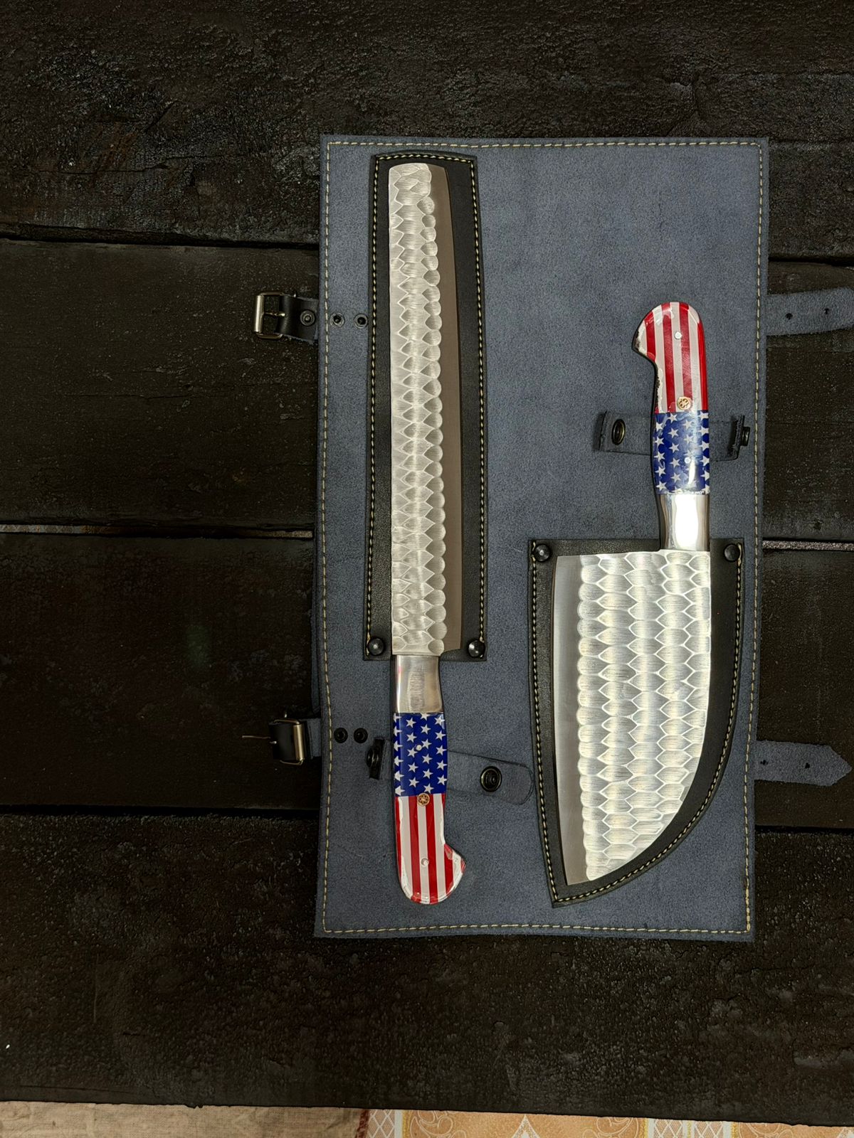 Knife set with American flag design on a dark wooden background